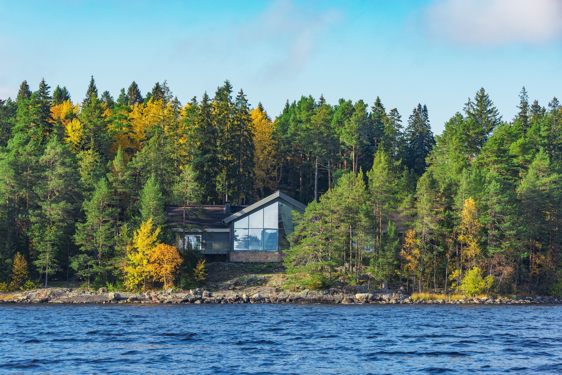 Luxury house in the autumn forest.