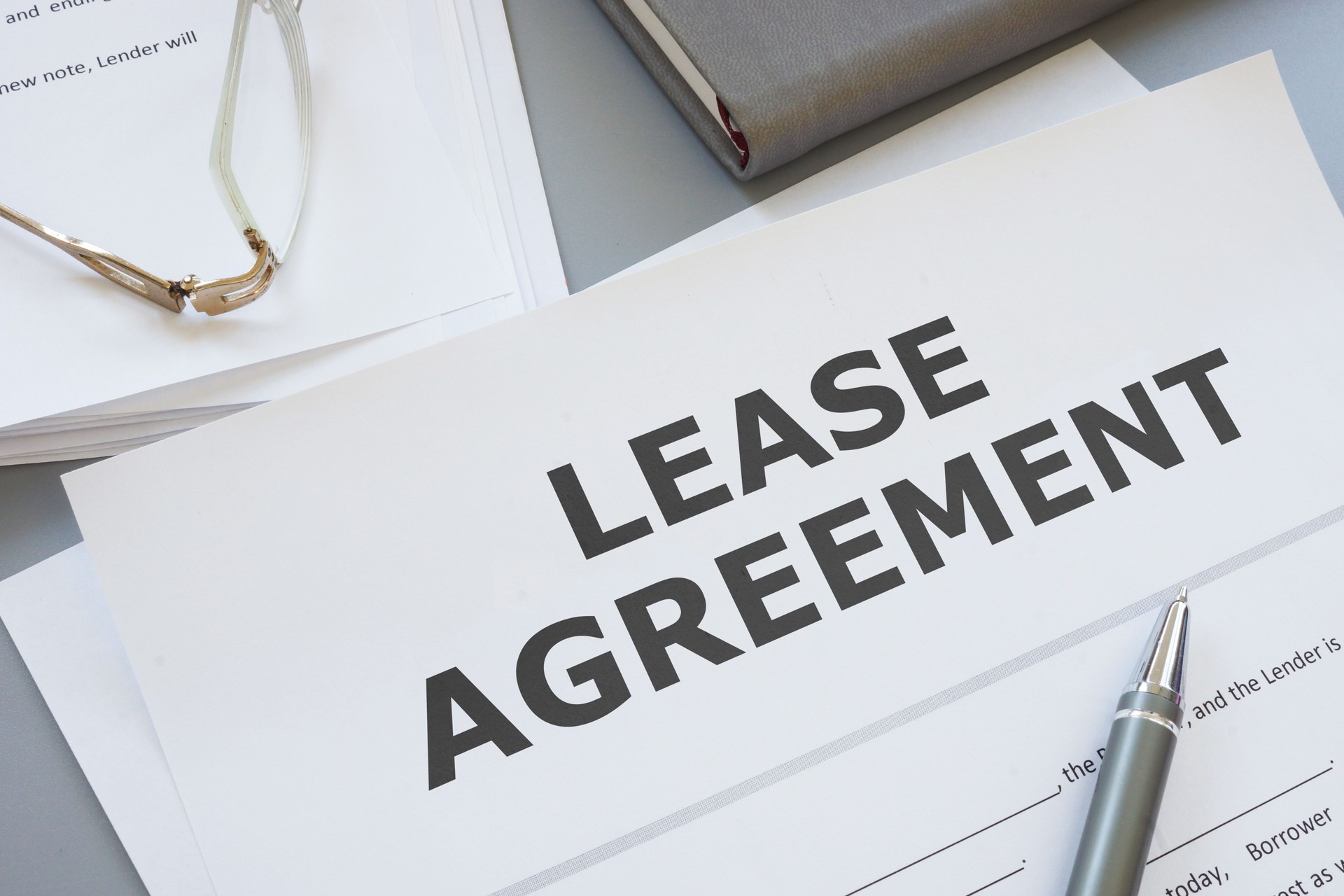 Lease agreement is shown on the photo using the text